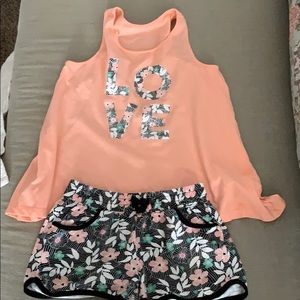 Loose Fitting Tank and knit Shorts.